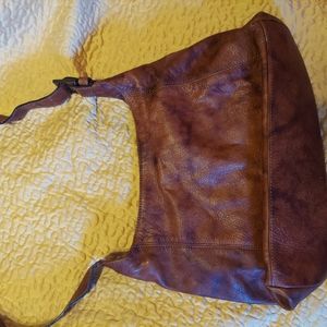 Distressed leather handbag